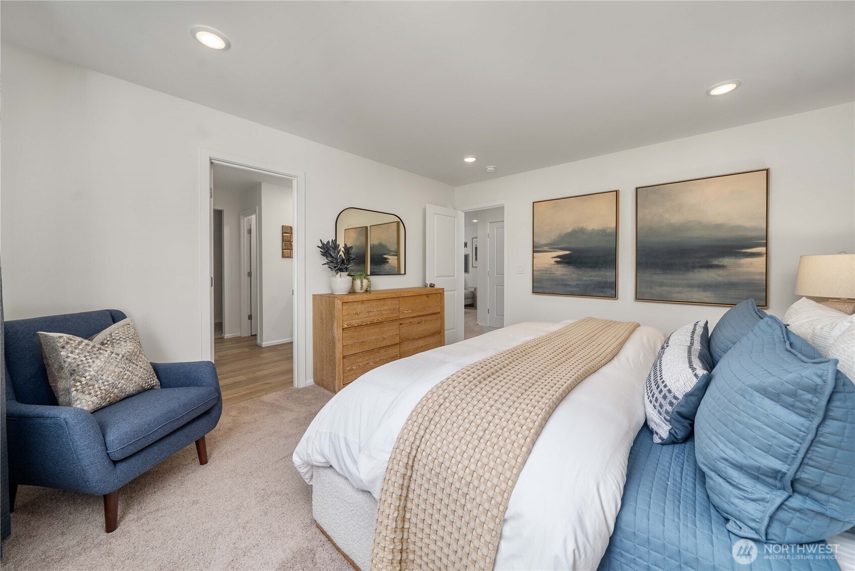 13411 324th Avenue Southeast Sultan, WA 98294 - Photo 19 of 23 a spacious bedroom with a bed and couch
