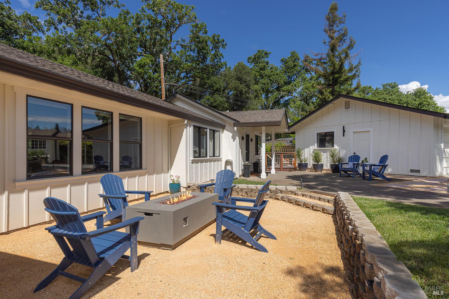 14734 Young Road Healdsburg, CA 95448 - Photo 4 of 47 a view of a house with backyard sitting area and garden