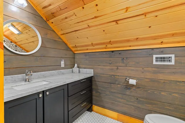 a view of backyard with large tree