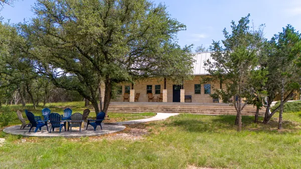 a view of a house with a patio