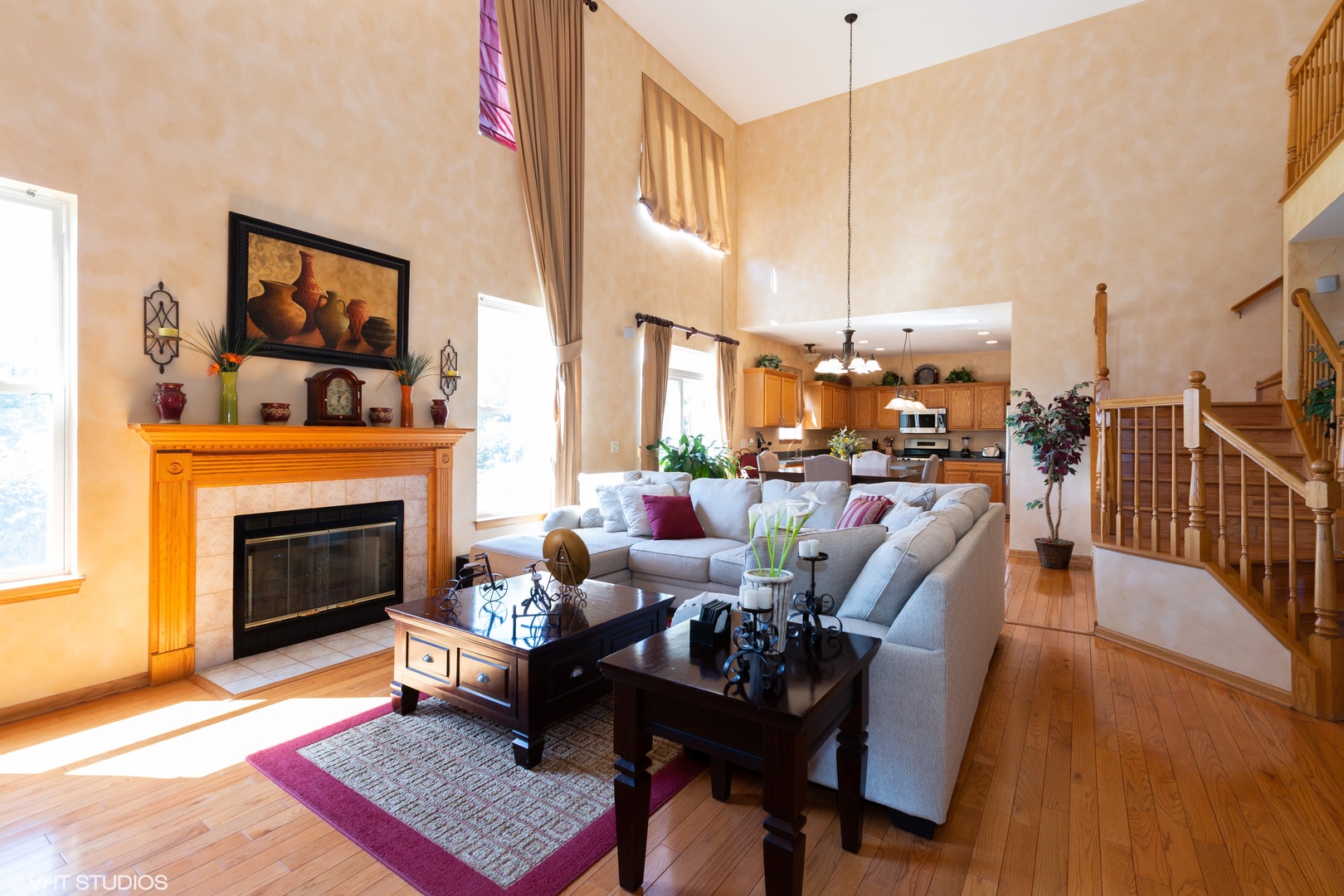3541 High Ridge Road Carpentersville, IL 60110 - Photo 8 of 18 a living room with furniture a fireplace and a dining table with wooden floor