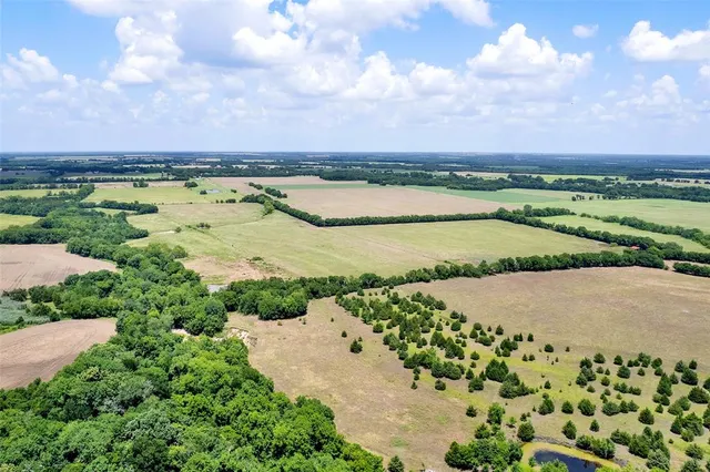 a view of a lake and a yard