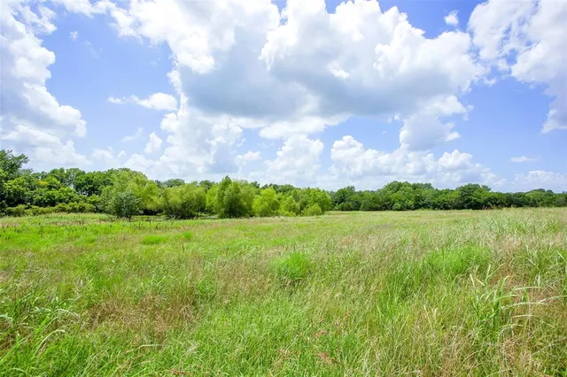 a view of an outdoor space and swimming pool