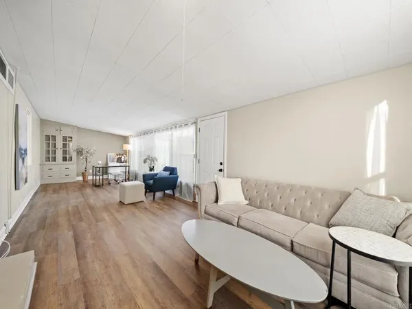 a living room with furniture and a couch