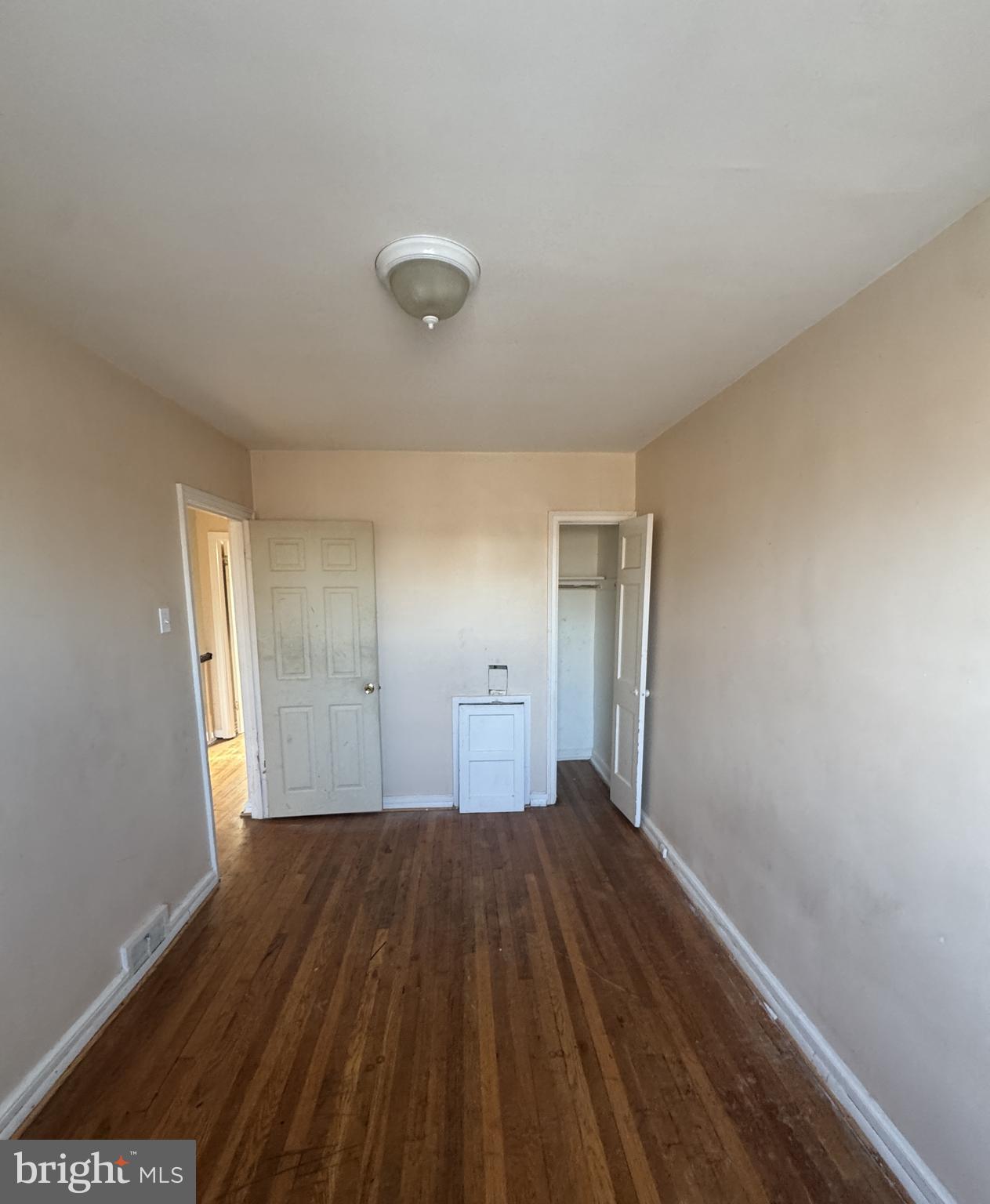 6048 Agusta Street Philadelphia, PA 19149 - Photo 13 of 24 a view of a room with wooden floor and a window