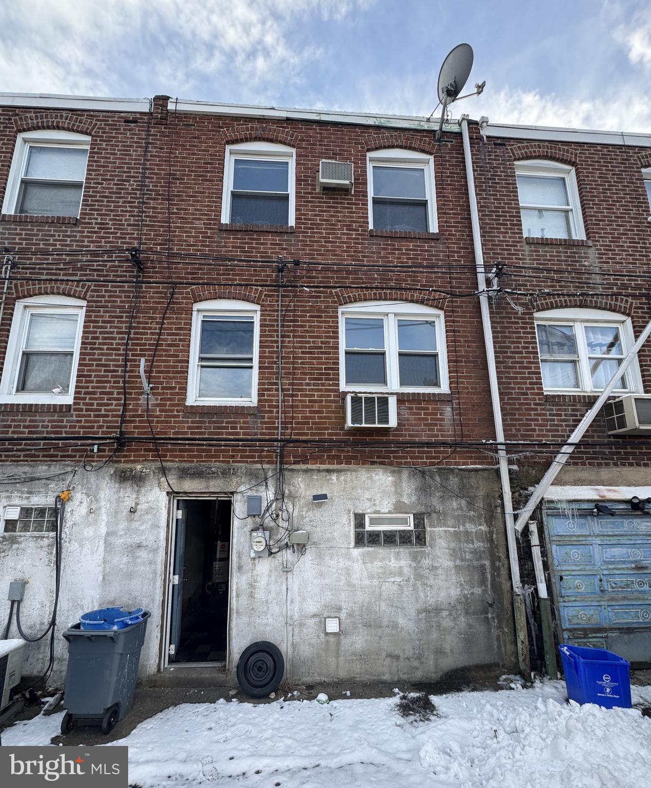 6048 Agusta Street Philadelphia, PA 19149 - Photo 24 of 24 a front view of a building with many windows