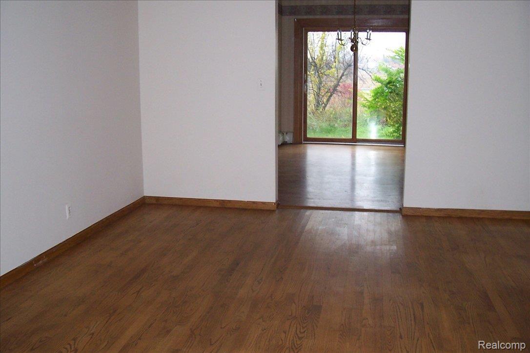 2970 North Hickory Ridge Road Highland, MI 48357 - Photo 8 of 12 Formal living or dining room