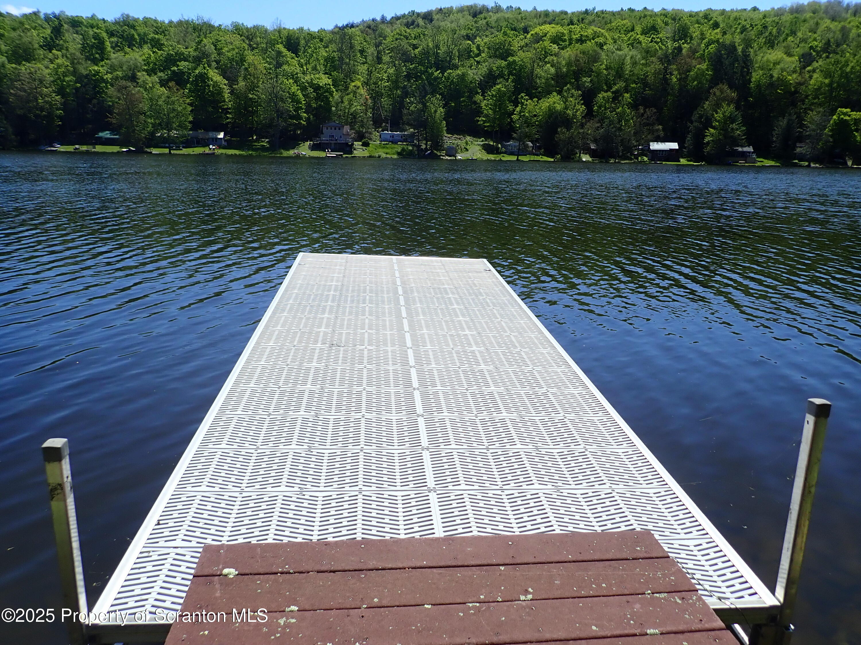 430 Crescent Lake Road Meshoppen, PA 18630 - Photo 13 of 51 a view of outdoor space with swimming pool and green space