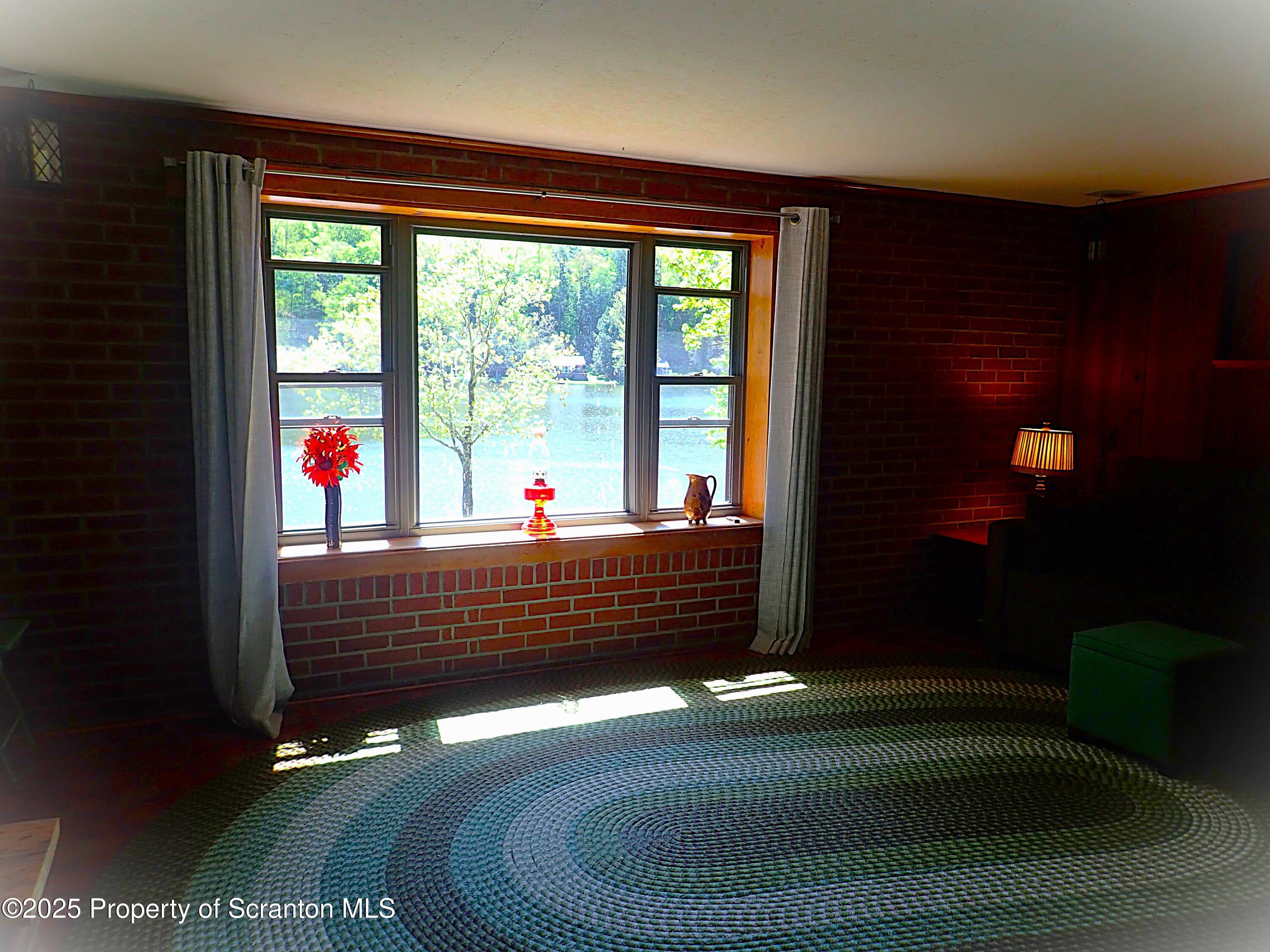 430 Crescent Lake Road Meshoppen, PA 18630 - Photo 16 of 51 a room with pool table and windows