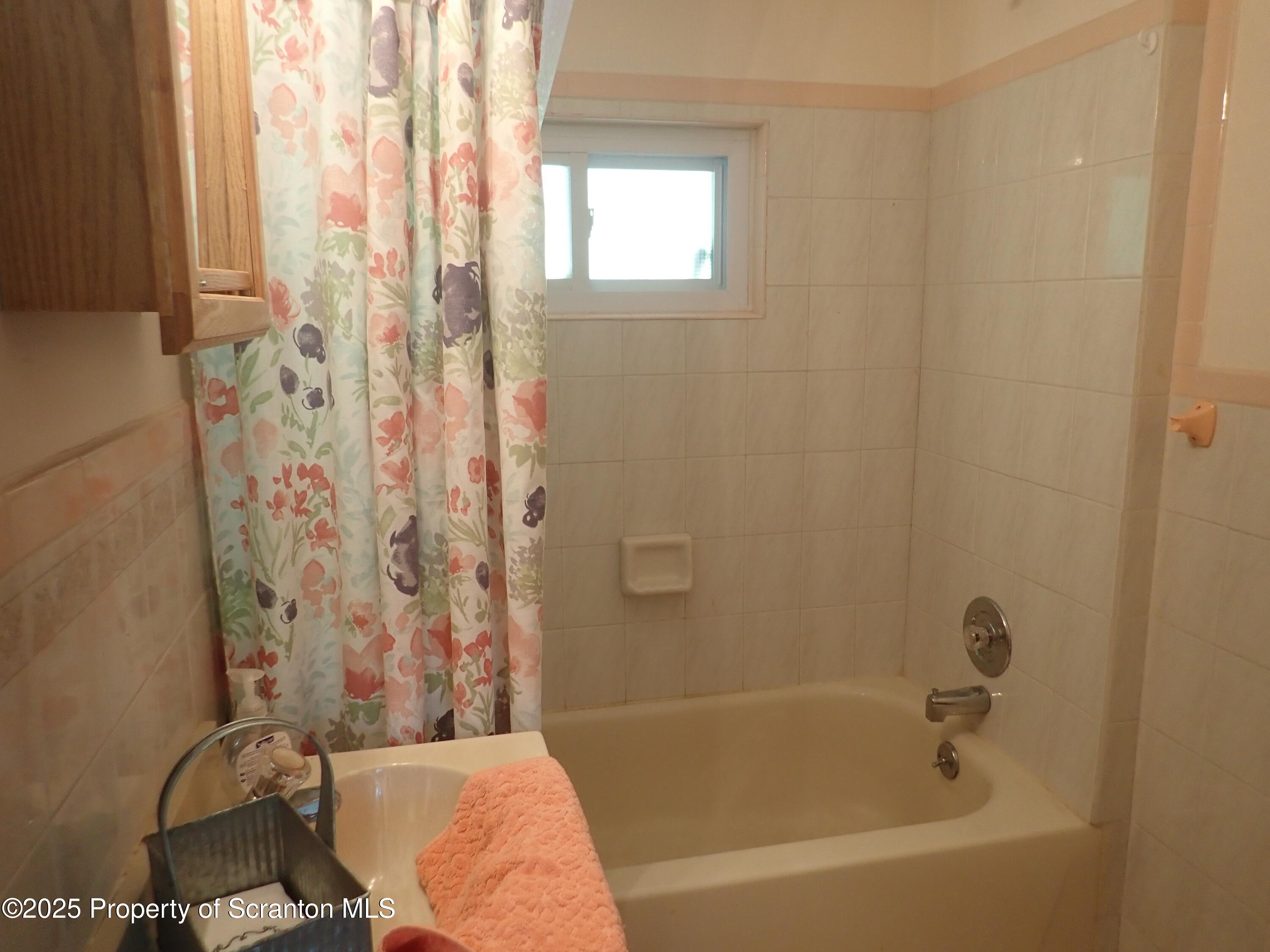 430 Crescent Lake Road Meshoppen, PA 18630 - Photo 28 of 51 a bathroom with a bathtub and shower