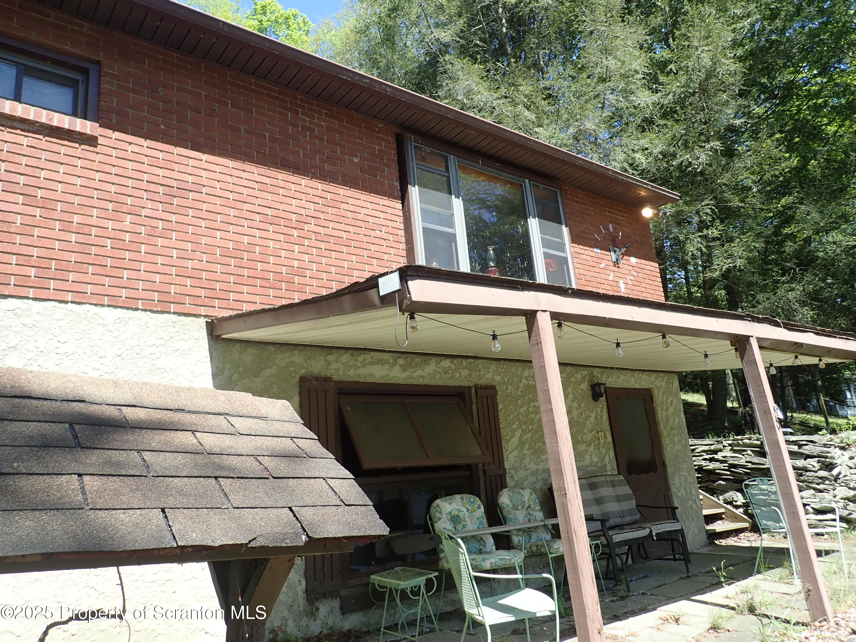 430 Crescent Lake Road Meshoppen, PA 18630 - Photo 40 of 51 a view of a house with a balcony
