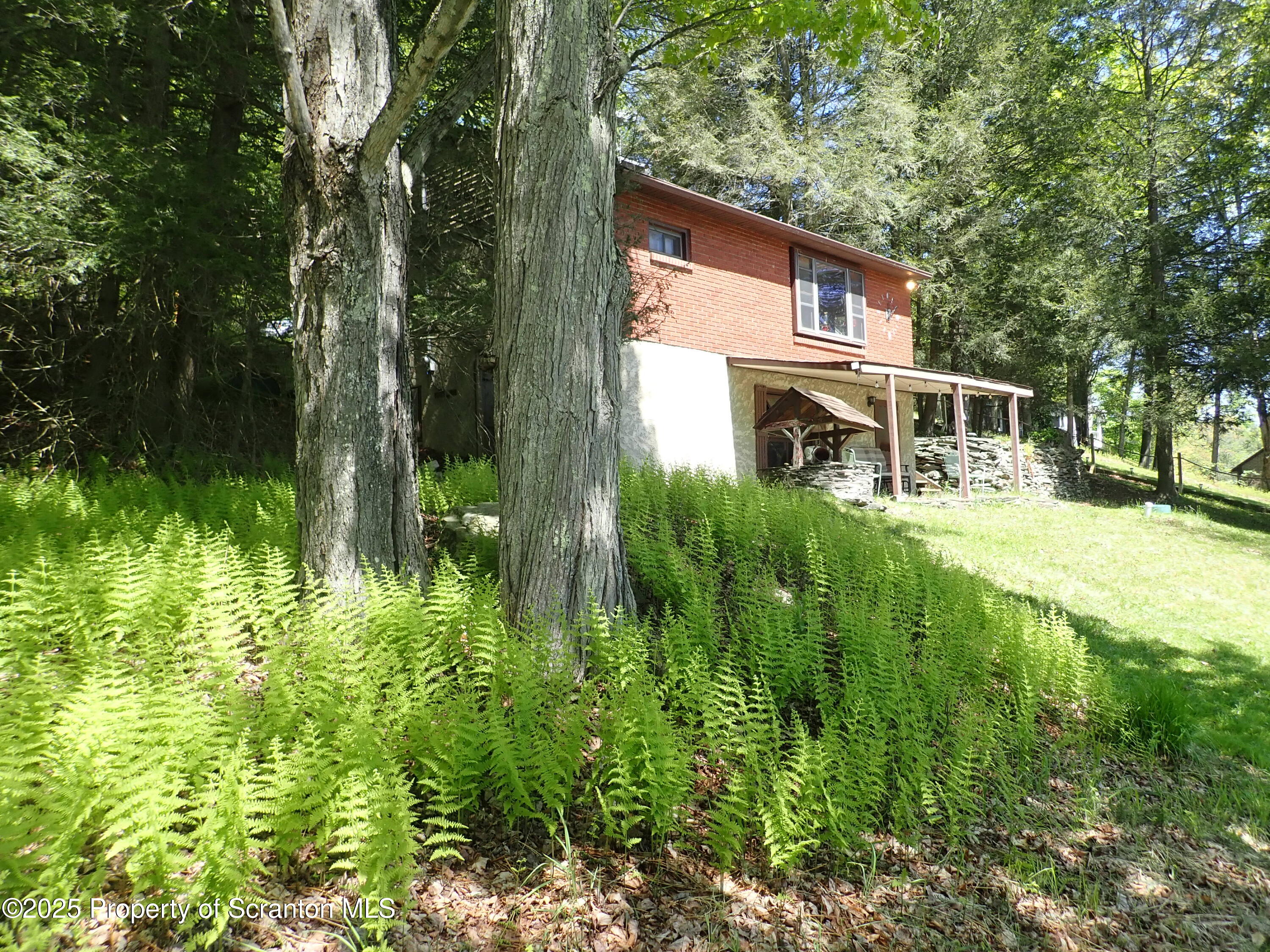 430 Crescent Lake Road Meshoppen, PA 18630 - Photo 7 of 51 a view of a house with a big yard