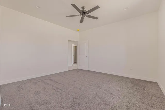 a bathroom with a double vanity sink toilet and shower