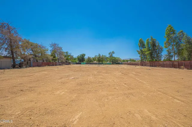 a bathroom with a sink and a yard
