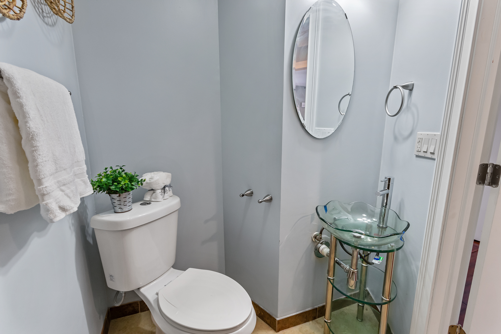 5855 Timberlane Road Matteson, IL 60443 - Photo 12 of 22 a bathroom with a toilet a sink and a mirror