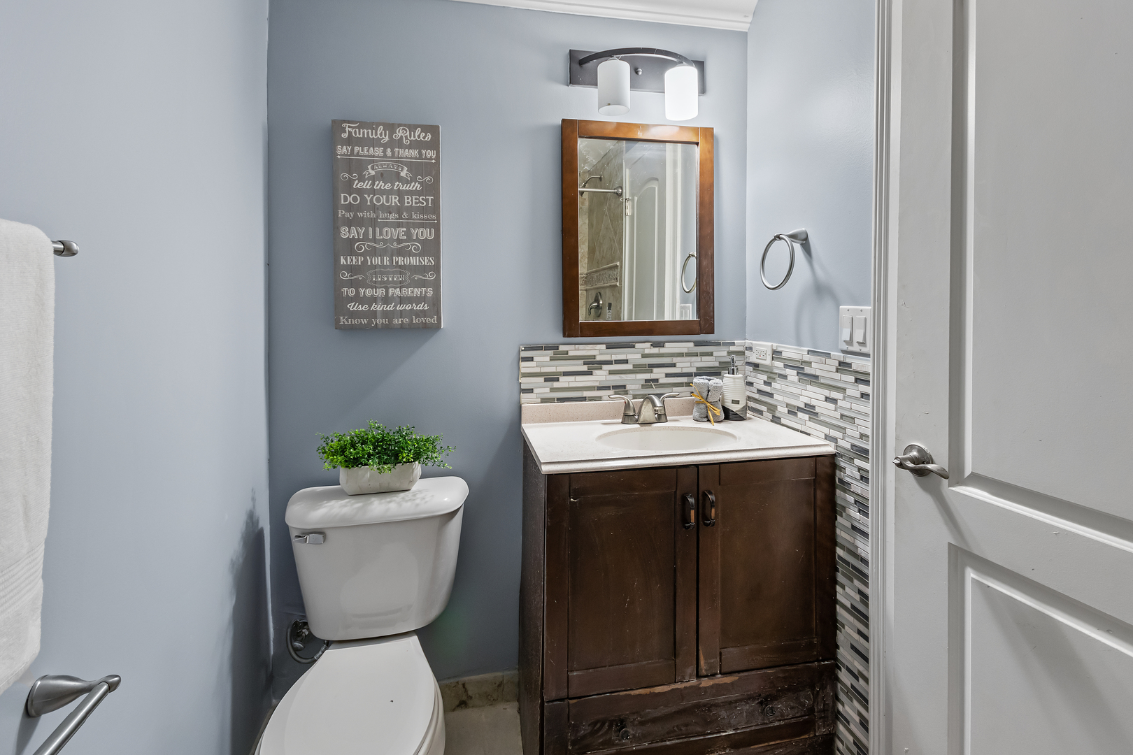 5855 Timberlane Road Matteson, IL 60443 - Photo 16 of 22 a bathroom with a sink mirror vanity and toilet