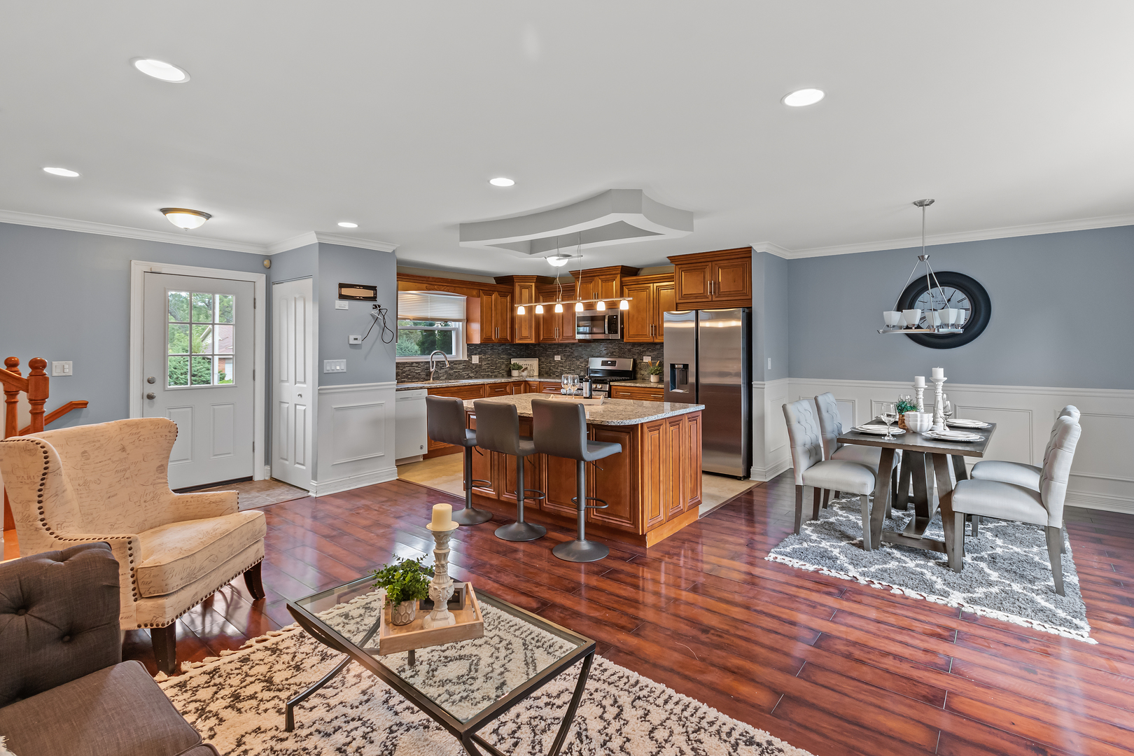 5855 Timberlane Road Matteson, IL 60443 - Photo 6 of 22 a living room with lots of furniture and kitchen view