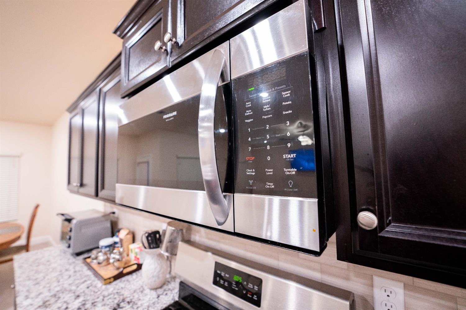 1818 Softwind Drive Tulare, CA 93274 - Photo 19 of 46 a bathroom with mirror and shower