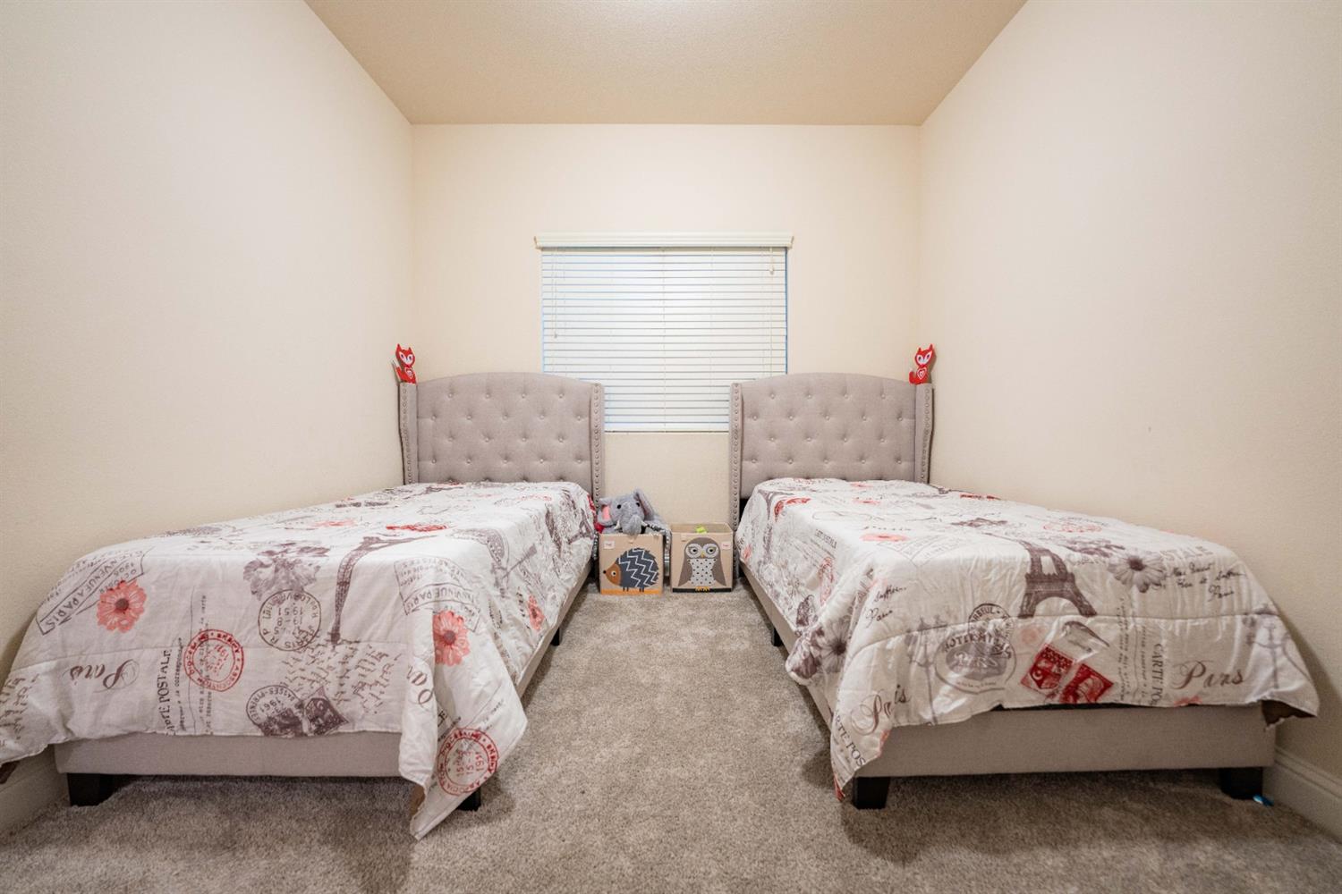 1818 Softwind Drive Tulare, CA 93274 - Photo 29 of 46 a bedroom with two beds and window