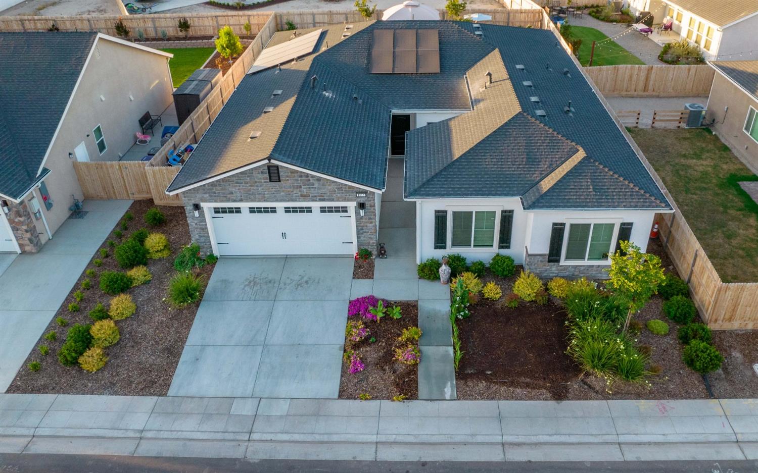 1818 Softwind Drive Tulare, CA 93274 - Photo 9 of 46 a front view of a house with entryway
