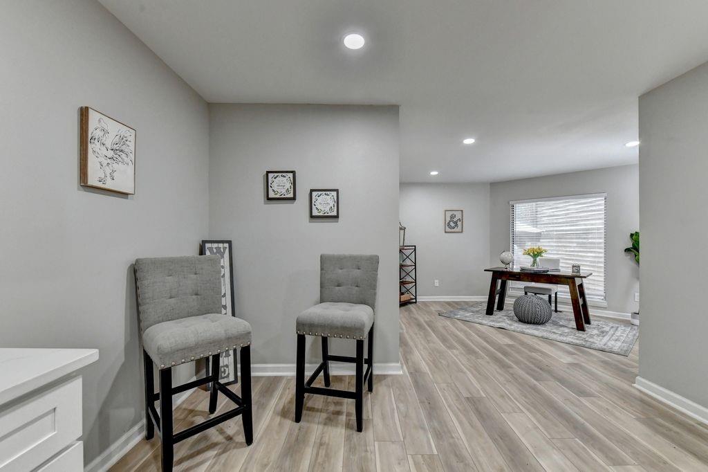 2503 Terrace Trail Decatur, GA 30035 - Photo 19 of 45 a room with furniture and wooden floor