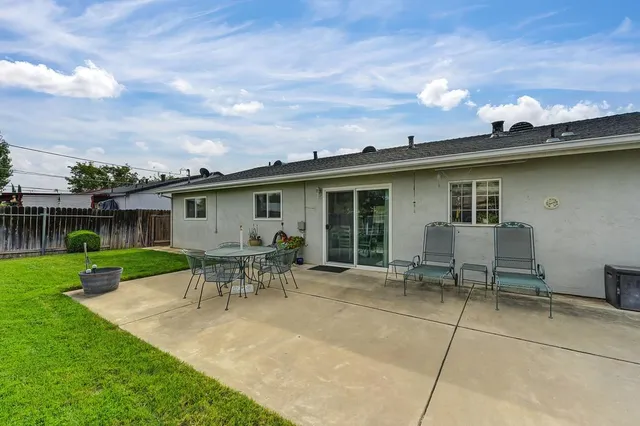 a view of a house with patio