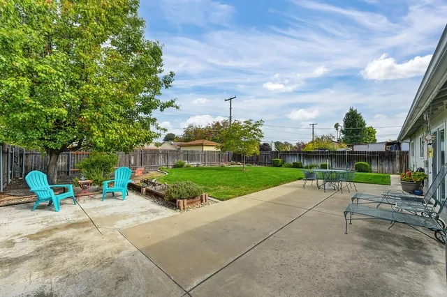 a garden view with a seating space