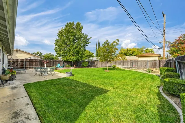 a view of a swimming pool with a garden