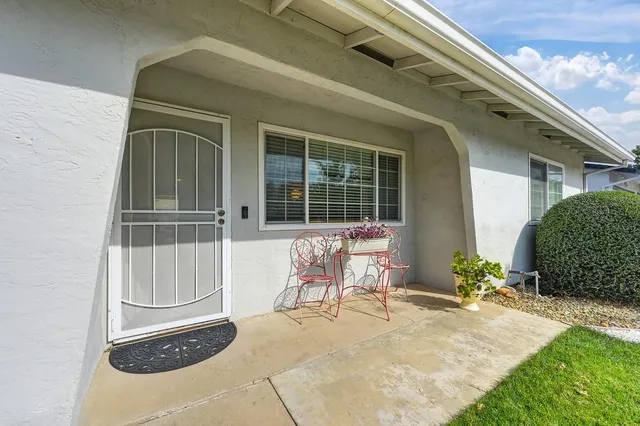 a view of house with outdoor space