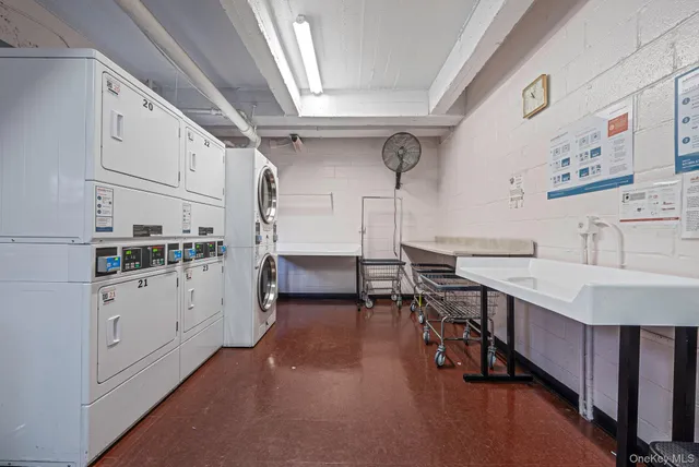 a kitchen with cabinets and window