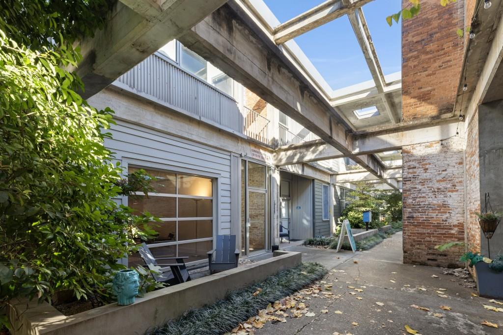 659 Auburn Avenue Northeast, Unit 120 Atlanta, GA 30312 - Photo 16 of 22 a front view of a house with garden