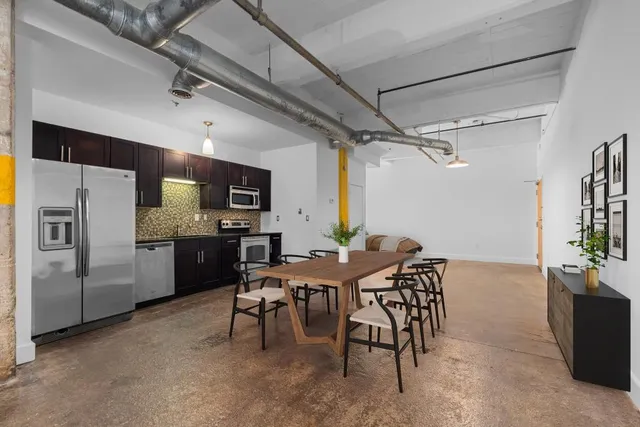 a view of a dining room with furniture