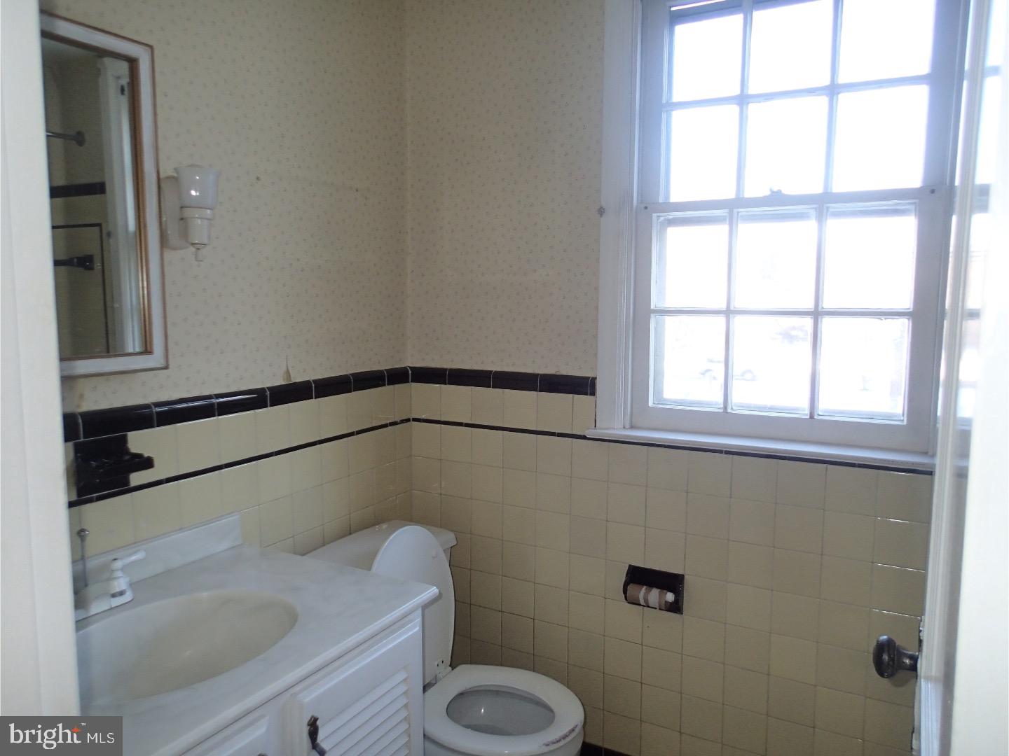 249 Fairview Road Springfield, PA 19064 - Photo 13 of 16 a bathroom with a sink and a toilet