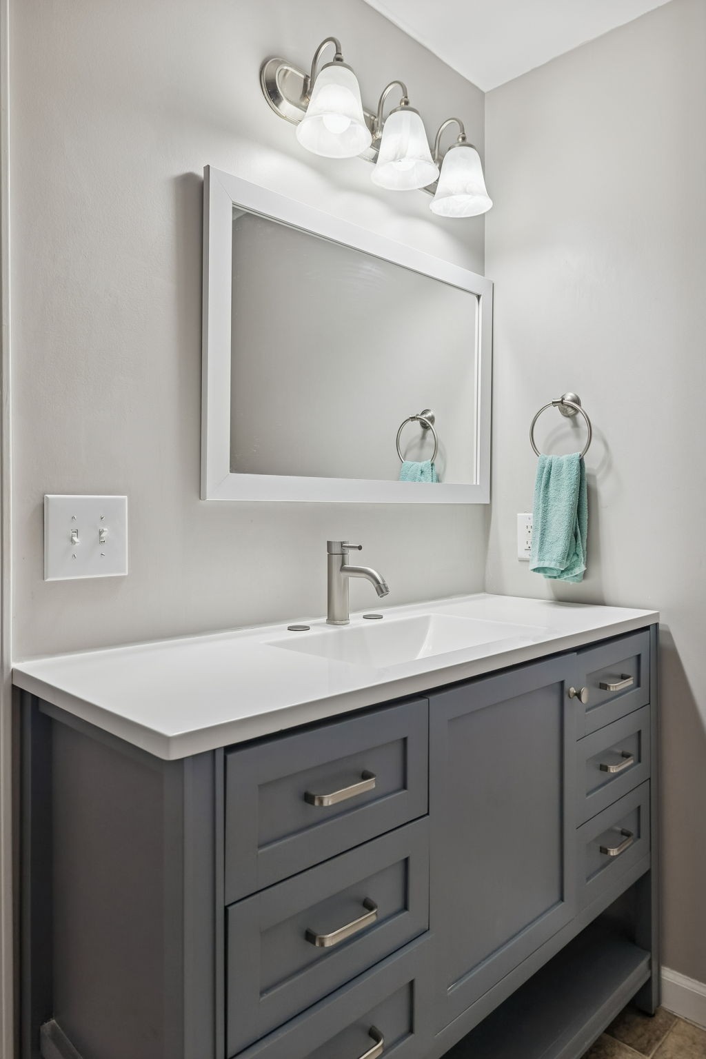 411 Purtle Road Lafayette, TN 37083 - Photo 18 of 40 a bathroom with a sink and a mirror