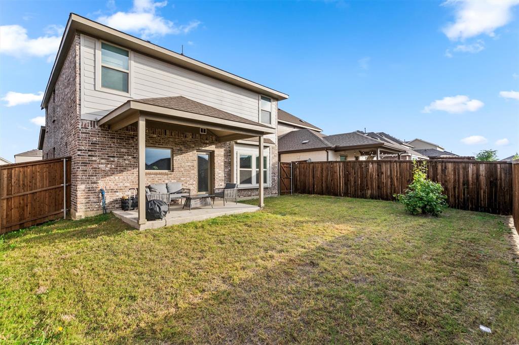 2407 Neff Lane Forney, TX 75126 - Photo 22 of 22 a view of a house with backyard and sitting area