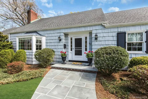 a house view with a garden space