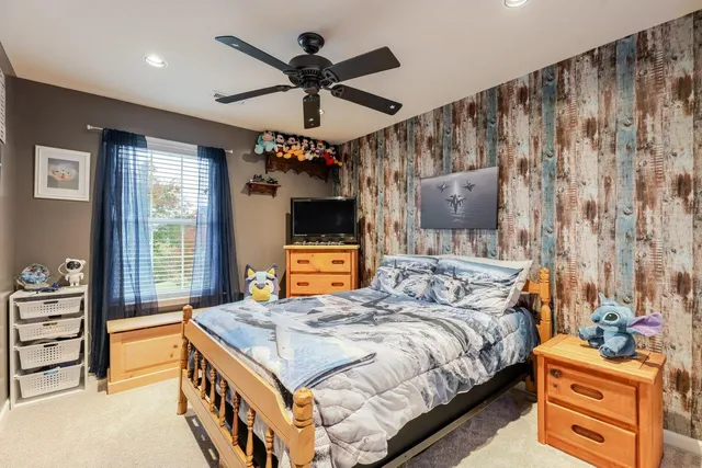 a room with furniture and a book shelf