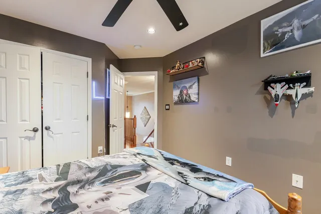 a view of a livingroom with workspace and a window