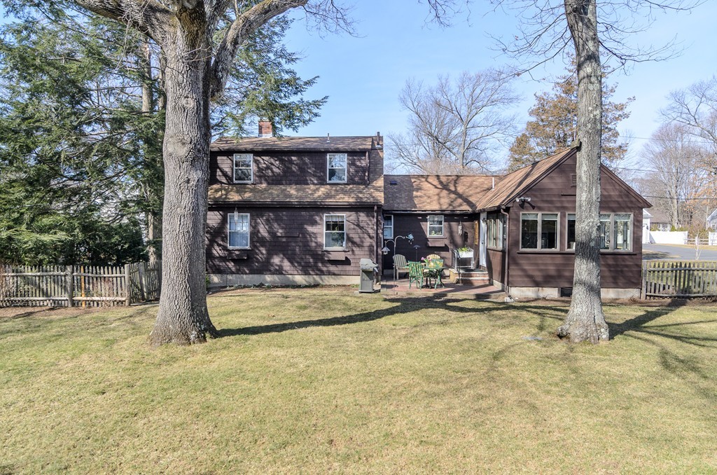 22 MacArthur Road Wellesley, MA 02482 - Photo 14 of 15 a view of a house with backyard and sitting area