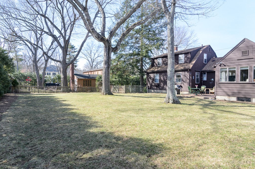 22 MacArthur Road Wellesley, MA 02482 - Photo 15 of 15 a house view with swimming pool in front of it