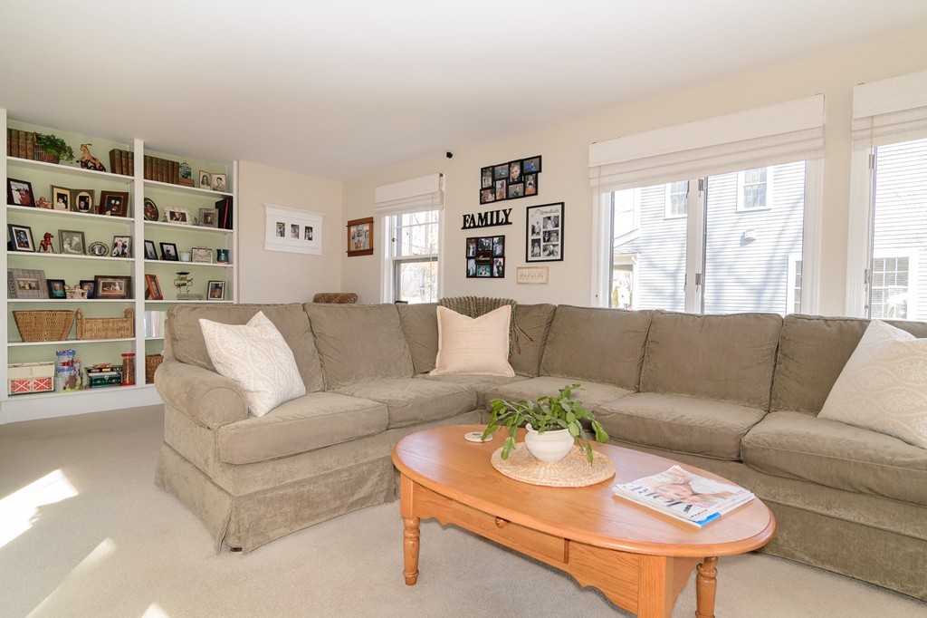 22 MacArthur Road Wellesley, MA 02482 - Photo 6 of 15 a living room with furniture and a large window