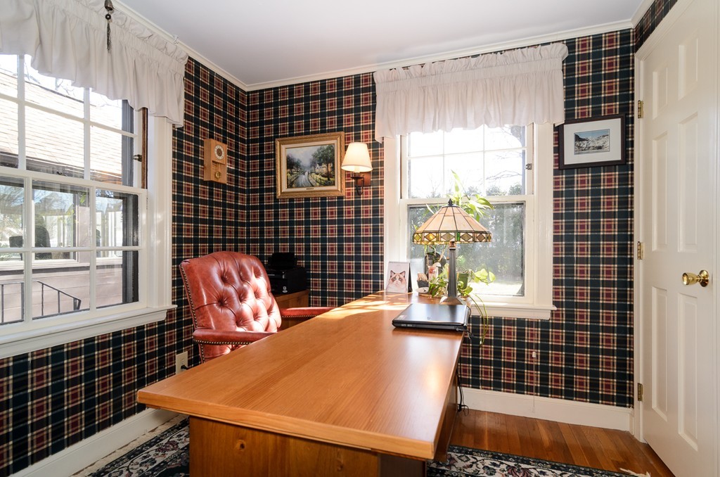 22 MacArthur Road Wellesley, MA 02482 - Photo 8 of 15 a view of a balcony with chair and table