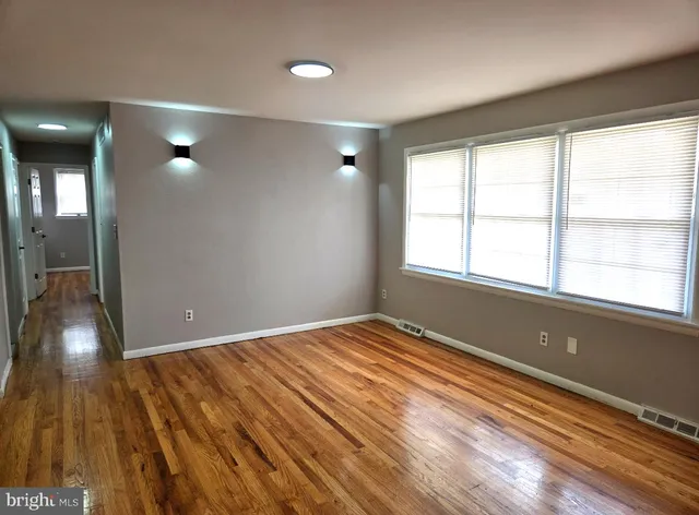 a view of an empty room and window