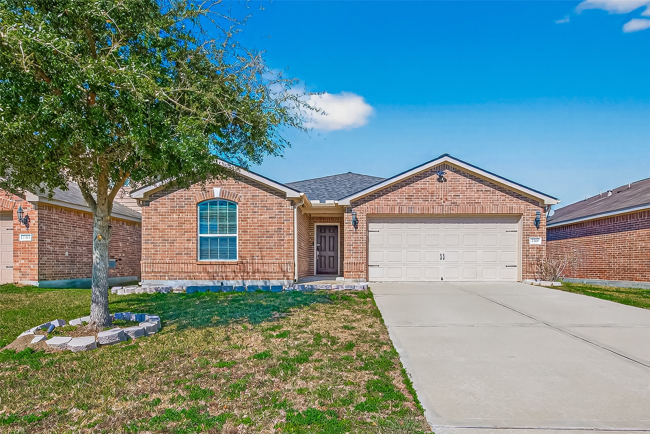 2319 Seabourne Trails Road Rosenberg, TX 77469 - Photo 2 of 36 a front view of a house with a yard and garage