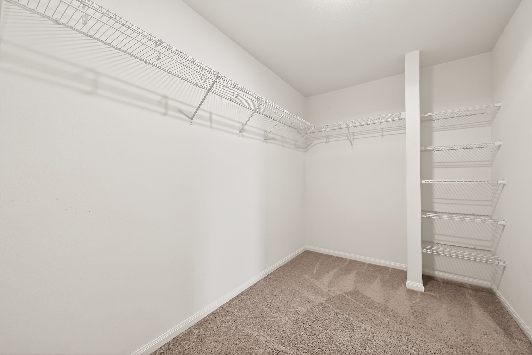 2319 Seabourne Trails Road Rosenberg, TX 77469 - Photo 25 of 36 a view of a room with empty racks