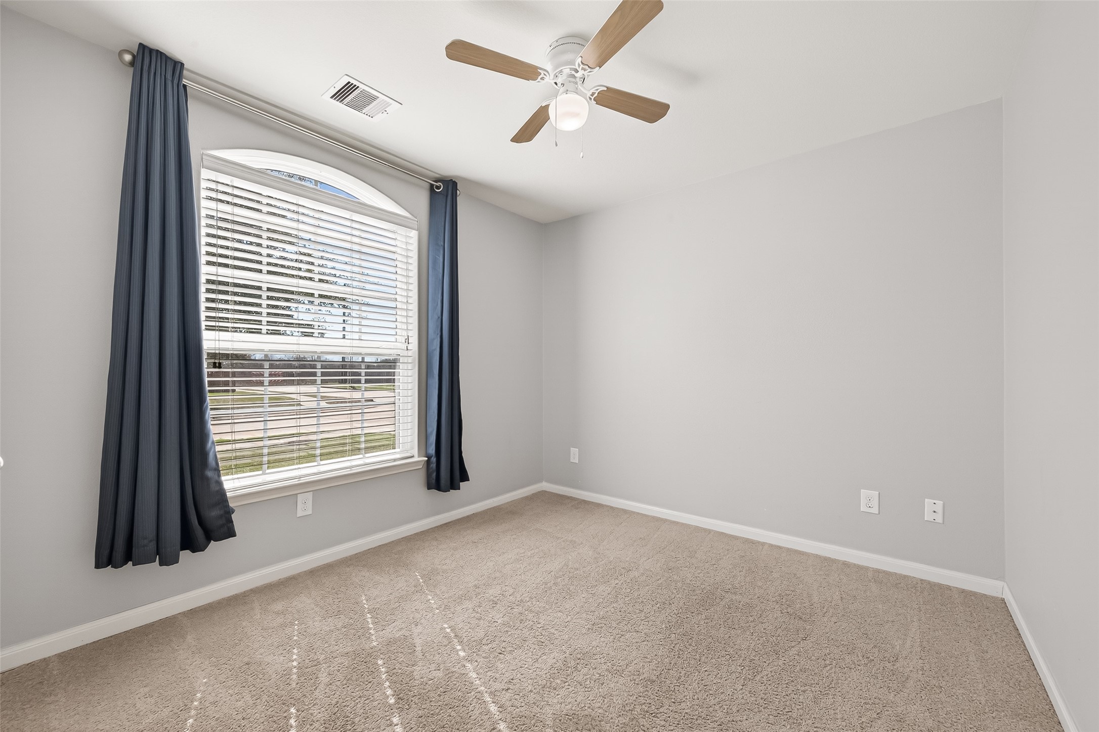 2319 Seabourne Trails Road Rosenberg, TX 77469 - Photo 29 of 36 a view of an empty room with a window