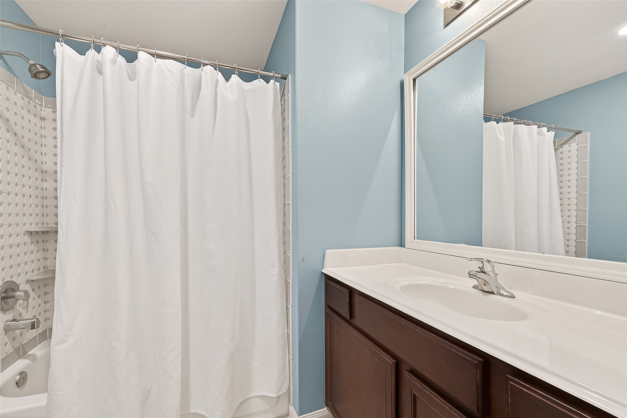 2319 Seabourne Trails Road Rosenberg, TX 77469 - Photo 31 of 36 a bathroom with a sink and a mirror