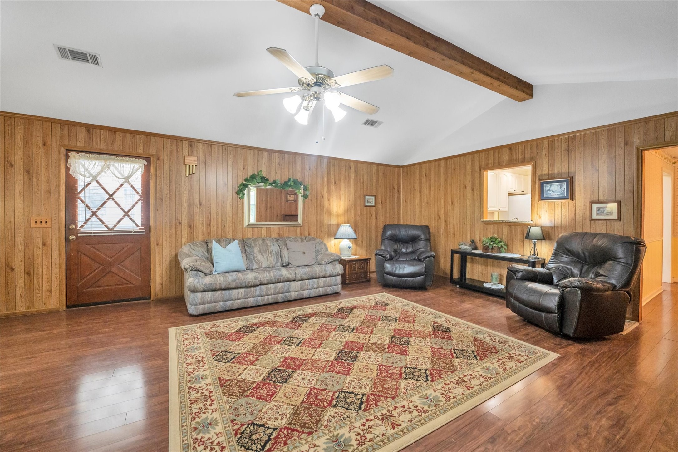 3197 Mann Road Conroe, TX 77303 - Photo 20 of 48 a living room with furniture and wooden floor