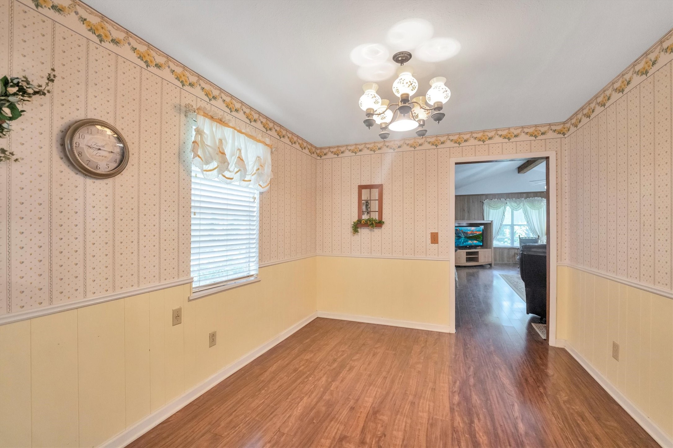 3197 Mann Road Conroe, TX 77303 - Photo 24 of 48 a view of livingroom with chandelier