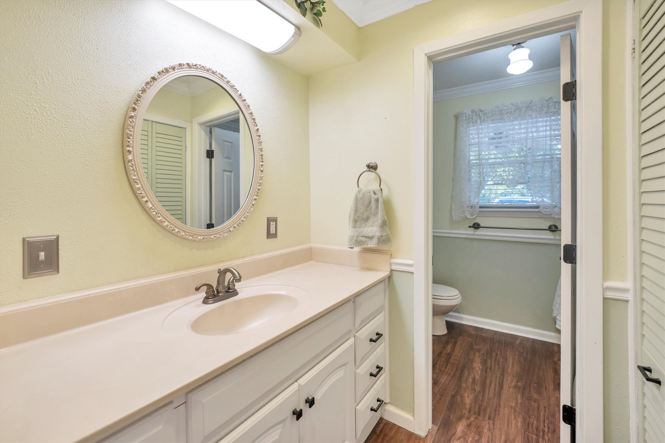 3197 Mann Road Conroe, TX 77303 - Photo 33 of 48 a bathroom with a sink and a mirror